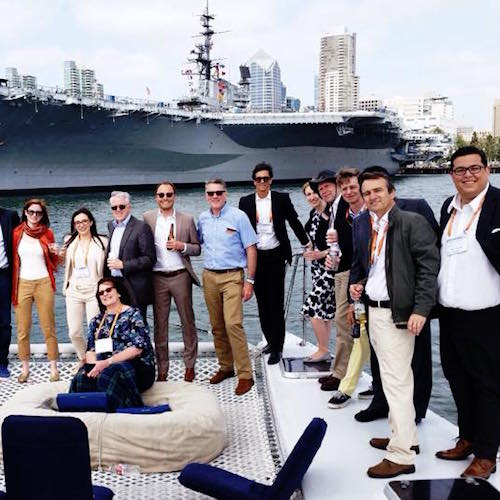 group of people from a company enjoy the catamaran event