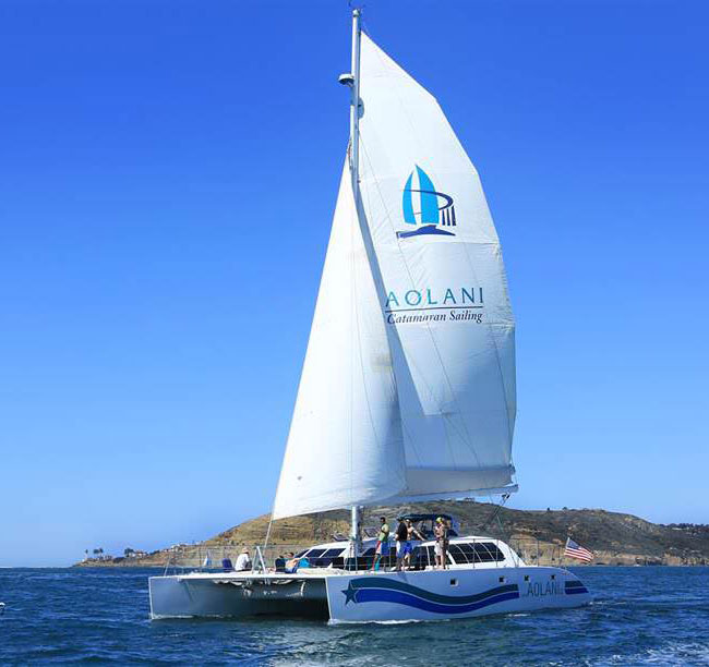 catamaran sailing on water