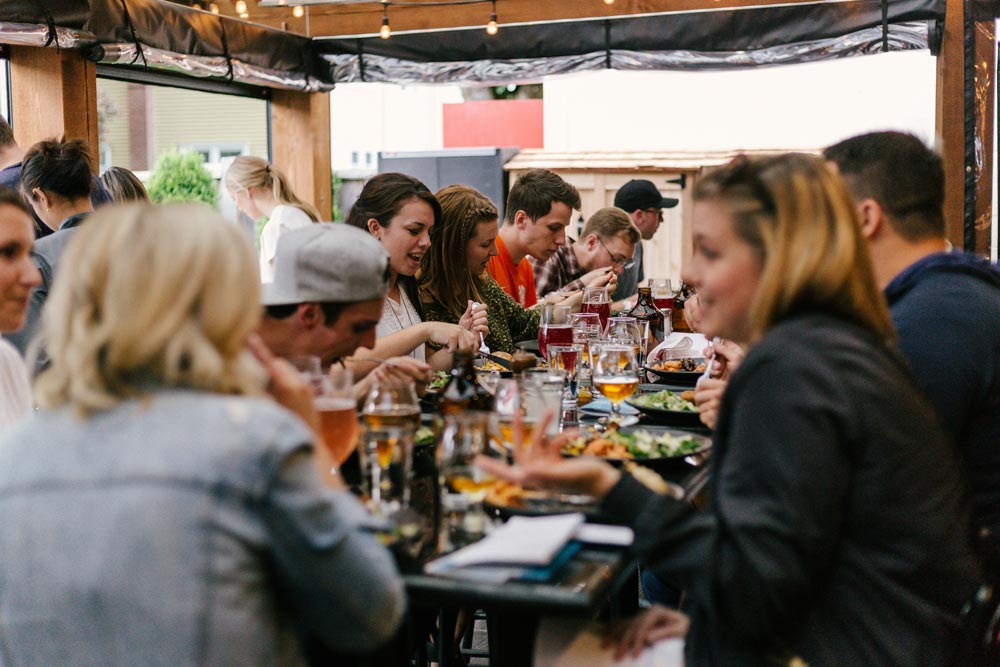 corporate event ideas eating dinner at restaurant